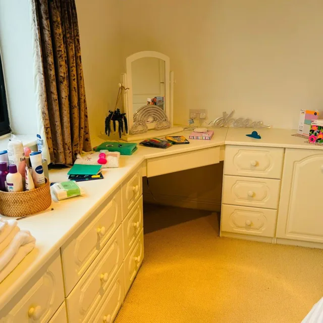 Bedroom dressing table, mirror and fitted storage at Little Ash Farm