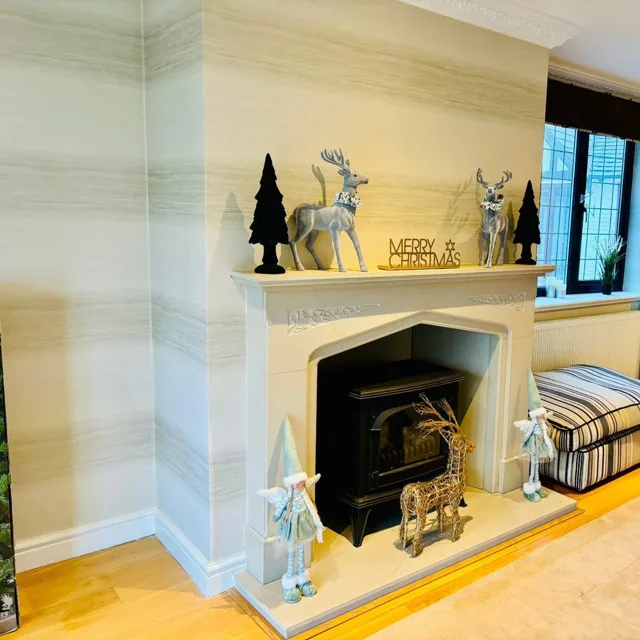 Little Ash Farm lounge fireplace with seasonal decorations